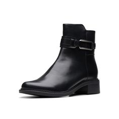 PRICES MAY VARY. Stacked block heel Side-zip boot Cushioned footbed A durable TPR outsole with stacked block heel ensures stability Metal accented strap at the ankle Side Zip Boots, Clarks Women's, Soft Textiles, Metallic Accents, Side Zip, Special Features, Block Heels, Ankle Boot, Leather Upper