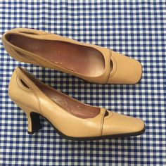 Wonderful vintage tan heels with pretty cut-outs on the toe and sides. These unique heels are light tan leather with a square toe and a squared kitten style heel. Designer:  Nine West Stamped Women's Size 6.5M, though please see measurements below for best fit. Measurements: 10" long 3" across ball of foot 3" heel In good vintage condition with light wear.  Interior of the shoes have scuffing to the leather, though this is not noticeable due to the placement. Shipping: USPS Standard Post (insurance tracking included) We are happy to ship internationally! *Due to the variability in shipping costs based on location, anything in excess of $2.00 over the actual cost will be refunded.  We can provide a combined shipping cost and/or estimate to your location. Refunds and Exchanges: All sales are Vintage Closed Toe Heels With 4-inch Heel, Vintage Heels With 4-inch Heel And Closed Toe, Retro Synthetic Heels With 4-inch Heel, Vintage Heels With 4-inch Heel And Medium Width, Vintage Brown Retro Closed-toe Heels, Vintage Pumps, Unique Heels, Nine West Heels, Tan Heels