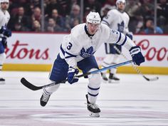 the toronto maple's hockey player is about to make his way down the ice