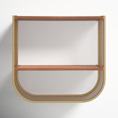 a wooden shelf with two shelves on each side and a white wall in the background