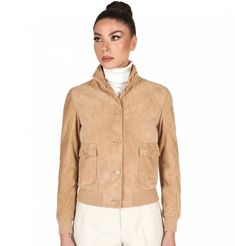 Women's Suede Trucker Leather Bomber Jacket In Tan Brown Discover the epitome of timeless elegance with our women's suede trucker leather jacket. Crafted from luxurious goatskin with a soft suede finish, this suede bomber jacket boasts a sophisticated turtle neck collar and button closure. Its inner shell is lined with smooth viscose, ensuring comfort. Featuring rib knit cuffs, one inside pocket, and two side pockets with buttons, this tan brown jacket blends functionality with fashion. Outer Shell: Genuine Leather Leather Type: Goatskin Leather Finish: Suede Inner Shell: Viscose Lining Closure Style: Button Collar Style: Turtle Neck Cuffs Style: Rib Knit Inside Pockets: One Outside Pockets: Two Side Pockets With Button Color: Tan Brown Leather Shorts Women, Short Leather Skirts, Women Trucker, Leather Jumpsuit, Sheepskin Jacket, Western Jacket, Distressed Jacket, Custom Jacket, Flight Jacket