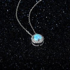 Features The round blue opal stone gives off an extremely classy and elegant look The opal stone is available in three unique and pretty color options such as blue, pink, and white The necklace is made from solid sterling silver with a round opal pendant to provide a stunning look This trendy jewelry is perfect for gifting option on any occasion Description Achieve a whole new look with this trendy and classic sterling silver necklace with an opal pendant! The elegant design of the pendant match October Birthstone Jewelry, Silver Jewelry Necklace, Stone Pendant Necklace, Opal Stone, Emerald Jewelry, 925 Silver Jewelry, Opal Pendants, Opal Necklace, Opal Jewelry