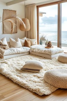 a living room filled with lots of white furniture