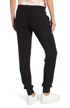 Comfy jogger pants composed of super-soft brushed knit add lounge-worthy style and comfort perfect for a night in. Fit: this style fits true to size. 10" rise, 32" inseam (size S) Elasticized drawstring waist Pull-on style Side slash pockets Brushed knit construction Ribbed ankles 77% polyester, 20% rayon, 3% spandex Machine wash cold Imported Trendy Joggers With Ribbed Waistband For Loungewear, Trendy Solid Color Joggers For Loungewear, Trendy Loungewear Joggers With Comfort Waistband, Trendy Joggers With Comfort Waistband, Trendy Joggers With Comfort Waistband For Loungewear, Trendy Stretch Joggers For Loungewear, Trendy Stretch Sweatpants For Lounging, Trendy Joggers For Lounging, Trendy Loungewear Joggers With Ribbed Cuffs