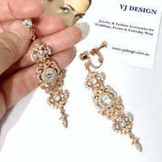 "Long chandelier cz bridal earrings with clipon tops featuring Victorian vintage wedding in Regency glam statement style, made of sparkly clear cubic zirconia in your choice of rose gold or silver plated tarnish-resistant finish. Earrings are about 2 3/4\" (7.2cm) long including clipons. View matching pieces or similar designs at https://www.etsy.com/shop/YJDesign?search_query=elviria View all Victorian inspired accessories https://etsy.me/2uAseFc Only selected earrings are offered in screw back Glamorous Dangle Clip-on Earrings For Weddings, Rose Gold Dangle Clip-on Earrings For Wedding, Statement Bridal Jewelry, Wedding Statement Earrings, Rose Gold Chandelier, Statement Earrings Wedding, Bridal Earrings Chandelier, Long Chandelier, Glamour Style