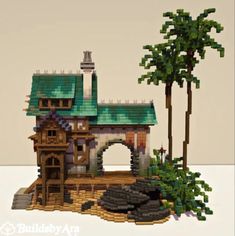 an image of a building made out of legos with trees in the foreground