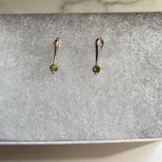 Beautiful Luxurious 14k White Gold Stud Earrings With Light Green Gemstone. I Think The Gemstone Is Peridot, But I’m Not Sure. It Is 100% A Real Gemstone, Considering The Earrings Are 14k White Gold (See Stamp In Photo 3), I’m Just Not Sure What Kind. It Looks Very Similar To Peridot. Like New Condition, Comes Gift Wrapped. #Luxury #Celebstyle #Gold #Silver #Jewelry #Elegant #Japanesestreetwear #Streetwear #Avantgarde #Selfexpression #Vintage #Chic #Metallic #Luxe #Colorful Modern Peridot Jewelry For Formal Occasions, White Gold Sterling Silver Birthstone Earrings, White Gold Sterling Silver Gemstone Earrings, Elegant Peridot Earrings For Anniversary, Elegant Peridot Earrings For Wedding, Formal Peridot Jewelry For May Birthstone, Fine Jewelry Peridot Earrings As Gift, Fine Jewelry Peridot Earrings For Gift, Green Modern Sterling Silver Earrings