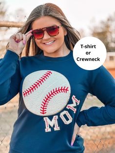 "Baseball mom T shirt or baseball mom sweatshirt made with real chenille patches! This baseball shirt features a large and soft soccer chenille patch. Great gift for the baseball lover in your life and can be customized with any name or just the baseball!  -Gildan soft style t shirt or Gildan unisex sweatshirt in sizes S-XXL -See photos for color chart. Looking for a custom color? Custom orders welcome! -Shirt can be customized. Can be Baseball only or feature any name or word around the ball. L Crew Neck Baseball Jersey For Baseball Season, Baseball Season Relaxed Fit Sweatshirt, Customizable Casual T-shirt With Baseball Collar, Customizable Cotton Tops With Baseball Collar, New Arrival Design, Chenille Sweatshirt, Baseball Sweatshirts, Baseball Mom Shirt, Bag Patches