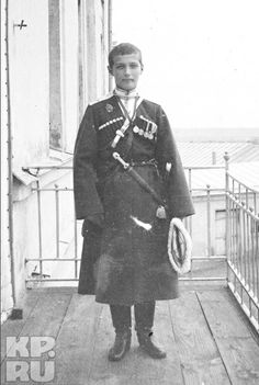 an old black and white photo of a man in uniform on a porch holding a hat