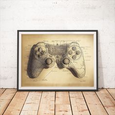 a drawing of a video game controller on a wooden floor in front of a brick wall