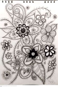 a drawing of flowers and leaves on paper