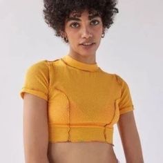 Urban Outfitters Tops | Bdg Paige Sheer Mesh Mock Neck Top - Gold | Color: Gold/Yellow Size M Yellow Stretch Short Sleeve Crop Top, Casual Yellow Cropped Crop Top, Trendy Fitted Yellow Top, Yellow Fitted Trendy Top, Fitted Trendy Yellow Top, Yellow Cropped Stretch Tops, Mustard Stretchy Summer Top, Yellow Stretch Crop Top, Trendy Fitted Yellow Crop Top