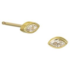 Pair of elegant studs in 14k solid gold with marquise genuine diamonds. These are the perfect earrings for a second or third piercing to compliment a modern ear stack. Simple, classic, and elegant. -14k Yellow Gold -3.25 x 1.75mm marquise genuine diamonds -timeless bezel setting -post backs included -butterfly clasp -sold as a pair Third Piercing, Ear Stack, Jewelry Diamond, Marquise Diamond, Diamond Studs, Bezel Setting, Diamond Jewelry, Solid Gold, Fine Jewelry