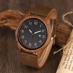 ⭐ High-Quality Casual Watch with Reasonable Price  ⭐ Genuine Leather Strap ⭐ Professional Engraving Services  ⭐ Ideal Anniversary Gift for Husband, Best Birthday Gift for Men ✅ Crafted from high-quality Natural Wood - Walnut watch with a genuine leather strap, it is healthy, lightweight, fashion design, Comfortable to wear and durable. ✅ Accurate Japanese Quartz Movement - Japanese quartz movement to guarantee accurate time, the original battery can last more than 2 years. ✅ Engraved Men's Watch - Surprise your husband, boyfriend, dad, or son with this stunning watch on many occasions, including birthday, anniversary, Father's Day, Wedding Day, Graduation, Retirement or special moments in your relationship.  ✅ Professional Engraving Service - We provide a variety of style options for engra Brown Automatic Watch Ideal For Gift, Brown Watch Accessories With Subdials As Gift, Gift Watches With Date Display, Round Watches With Date Display As Gift, Brown Watch Accessories With Rectangular Dial For Gifts, Brown Rectangular Dial Watch Accessories For Gifts, Brown Rectangular Dial Watch Accessories As Gift, Brown Analog Display Watch As Gift, Chronograph Watch With Rectangular Dial For Gift