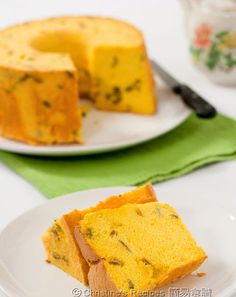 two plates with slices of cake on them