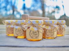 honey jars tied with twine and labeled maple syrup