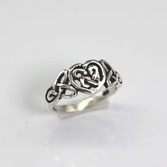 Celtic Knot Meanings. ... These knots are complete loops that have no start or finish and could be said to represent eternity whether this means loyalty, faith, friendship or love. Only one thread is used in each design which symbolises how life and eternity are interconnected. METAL .925 Sterling Silver Little Oxidized Celtic Knot Meanings, Friendship Ring, Celtic Trinity Knot, Friendship Rings, Love And Friendship, Trinity Knot, Celtic Rings, Infinity Heart, Sterling Silver Engagement Rings