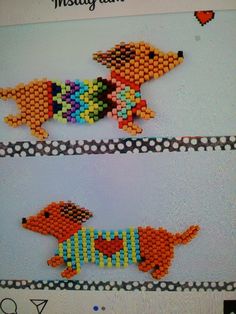 two beaded dachshund dogs sitting next to each other