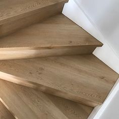 a close up view of a wooden staircase