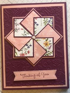 a card with flowers on it that says thinking of you