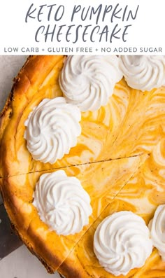 a close up of a pie with whipped cream on top and the words keto pumpkin cheesecake above it