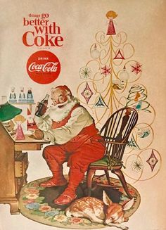 an old advertisement for coca cola featuring santa sitting at a desk with a dog sleeping on the floor