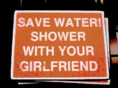 a sign that says save water shower with your girlfriend