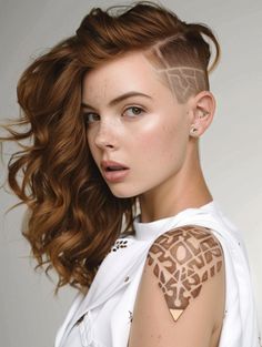 An undercut with a custom design carved into the sides can transform a simple buzz into a work of art. This style is particularly appealing for those looking to make a stylish statement. Suitable for all face shapes, it lets you play with different designs ranging from geometric patterns to floral motifs. To Cute, Texturizer On Natural Hair, New Hairstyle, Long Bangs, Long Faces, Round Faces, Buzz Cut, Undercut, Floral Motifs