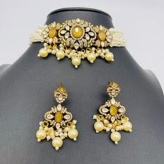 We bring beautiful Jewelry sure to elevate any look! Kindly pay attention to all photos and video and ask questions about the item prior to ordering. Yellow Pearl Wedding Jewelry, Elegant Yellow Choker Jewelry, Elegant Yellow Bridal Necklace For Festive Occasion, Elegant Yellow Kundan Necklace As Gift, Elegant Yellow Kundan Jewelry, Elegant Yellow Kundan Necklace Gift, Set Earrings, Choker Necklace Set, Deodorant Spray