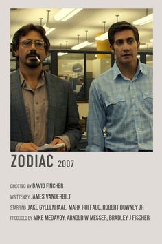 two men standing next to each other in front of a poster that says zodiac 2007