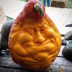 a pumpkin carved to look like a man's face