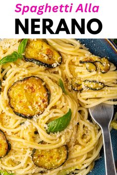 spaghetti with zucchini and spinach in a blue bowl