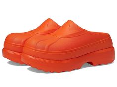 SOREL Caribou Clog - Women's Clog/Mule Shoes : Optimized Orange/Optimized Orange : Make your walk more comfortable by wearing SOREL Caribou Clog throughout the day. This clog features a round toe silhouette in a slip-on style. Fit tip: For 1/2 sizes, order next size up. Synthetic upper. Synthetic lining and insole. Iconic Caribou lug design provides proven traction. Synthetic outsole. Imported. Measurements: Heel Height: 1 3 4 in Weight: 11.3 oz Platform Height: 1 in Product measurements were ta Casual Orange Clogs With Rubber Sole, Sporty Waterproof Clogs With Round Toe, Waterproof Slip-on Casual Clogs, Casual Waterproof Slip-on Clogs, Comfortable Waterproof Slip-on Clogs, Waterproof Comfortable Slip-on Clogs, Walk More, Sorel Caribou, Army Green Jeans