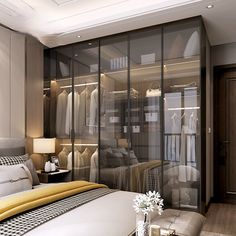 a bedroom with a bed and closets in it