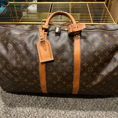 Vintage Used Good Condition Lv Keepall 50 Monogram Canvas No Strap Included Dust Bag Included Has Luggage Tag And Handle Strap Zippers Works Good Does Have Wear And Tear Nothing Major No Rips Patina Leather Around Does Have Some Cracking And Discoloration Lv Keepall, Louis Vuitton Keepall 50, Louis Vuitton Keepall, Vintage Louis Vuitton, Luggage Tag, Luggage Tags, Monogram Canvas, Travel Bags, Louis Vuitton Bag