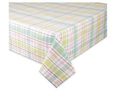 a plaid tablecloth with a green and pink checkered design on it, sitting on top of a white surface