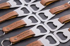 six bottle openers with leather labels on them