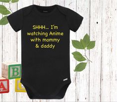 "\"SHHH...I'm watching Anime with mommy & daddy\" black baby bodysuit or toddler shirt. Please select your size and text color from the drop down boxes. Onesie/Toddler shirt Measurements: 0-3 Months fits baby's between 8-12 lbs and 21-24\"\" height. 3-6 Months fits baby's between 12-16 lbs and 24-26\" height. 6-9 Months fits baby's between 16-20 lbs and 26-28\" height. 12 Months fits baby's between 20-24 lbs and 28-30\" height. 18 Months fits baby's between 24-28 lbs and 30-32\" height. 2T f Anime Bodysuit, Anime Onesie, Funny Baby Shower Gifts, Funny Baby Onesie, Watching Anime, Black Onesie, Goth Baby, Animation Anime, Custom Baby Onesies