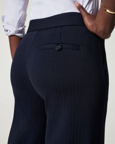 This smoothing pant comes in our premium ponte fabric with targeted compression built in, powered by SPANX CoreSure Tech™. With comfortable 4-way stretch and a high rise waist, this wide leg pant will have you feeling smooth from tummy to hip, and oh-so-comfortable throughout the wide leg. No zippers, no buttons, and no pockets (so no bulk!) at the hips—all for the ultimate smoothing effect. | Spanx Women's SPANXsmooth PerfectFit Ponte Wide Leg Pant Wide Leg Dress Pant, Dress Pants For Women, Pant For Women, Ponte Fabric, Wide Leg Dress Pants, Perfect Pant, Wide Leg Pant, Dress Pant, Sleek Look