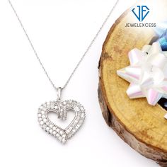 A Gift That Sparkles & Dazzles All: This timeless diamond heart pendant is sure to capture anyone’s heart. Fashioned with loads of brilliant white diamonds, this 1.00 carat heart necklace is romantic, dreamy and expertly crafted to reflect your love. Gorgeous 18 Inch Rope Chain Included: This Sterling Silver or 14K Gold-Plated Silver diamond heart necklace is beautifully suspended from a fashionable 18-inch rope chain, which is as durable as it is stylish. The chain can also be used with other p Heart Shaped Diamond Necklace, Sterling Silver Heart Pendant, Heart Necklace Diamond, Heart Pendant Diamond, Sterling Silver Heart, Heart Pendant Necklace, Diamond Heart, Gold Plated Silver, Silver Diamonds