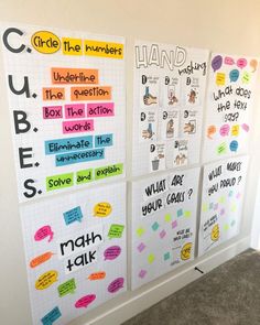 three bulletin boards with different types of words and phrases attached to the walls in an office