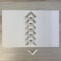 a piece of paper that has been cut into shapes