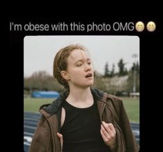 a woman standing in front of a track with her hand on her hip and the caption i'm obese with this photo omg