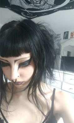 Goth Movie Characters, Unique Looking People, White Foundation Makeup Looks Goth, Goth Makeup No Foundation, Simple Trad Goth Makeup, Teased Hair Goth, No Brows, Goth Bleached Eyebrows