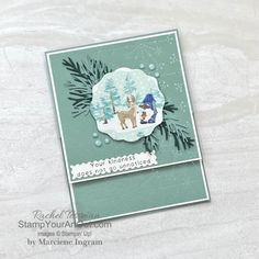 a christmas card with an image of two dogs in the snow