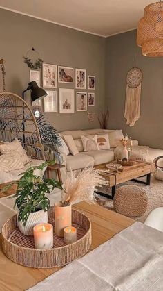 a living room filled with lots of furniture and decor on top of a wooden table