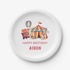 a paper plate with an image of a circus tent and animals on it that says happy birthday aiden