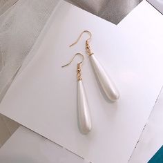 Teardrop Pearl Earrings | Pearl Drop Earrings with Shepherd Hook – Huge Tomato Tear Drop Pearl Earrings, Trendy White Pearl Drop Earrings, Trendy White Drop Pearl Earrings, Hypoallergenic Long Drop Pearl Earrings, Trendy White Pearl Earrings For Formal Occasions, Minimalist Dangle Pearl Earrings For Party, Chic Silver Teardrop Pearl Earrings, Trendy Dangle Pearl Drop Earrings, Trendy Pearl Drop Dangle Earrings