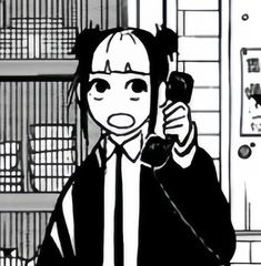 a cartoon character holding a cell phone to his ear in front of bookshelves