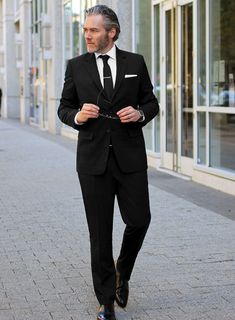 For your first good suit, the universally accepted rule among the fashionable crowd is to keep it black and our Black Merino Wool suit would be a great addition to your wardrobe. 
 
 Merino fibres are extremely fine, enabling them to bend far more than traditional, coarser wool fibres. This makes Merino wool fabric feel soft and luxuriously gentle next to your skin. 
 
 A stylish travel-friendly fabric, great for summer nights, winter days and best for business trips. 
 
Super 120's Wool, Lining Green Tweed Suit, White Linen Suit, Suits Black, Royal Blue Suit, Tweed Pants, Black Attire, Tweed Trousers, A Thing Of Beauty, J Black